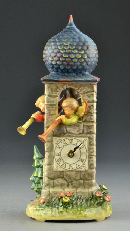 Hummel/Goebel Porcelain Tower Clock: Depicting angel blowing horn out of window of tower with clock mechanism, titled "Call to Worship," #441, 13" H, circa 20th century. Condition: excellent in original protective box. Property of a Peto