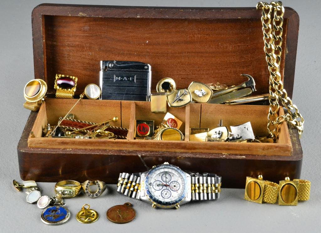 Collection Of Over 50 Pieces Of Gentleman's Jewelr: To include a Seiko Chronograph wrist watch, tie tacks, cufflinks including Swank, Dante goldtone chain link necklace and more, circa early to mid 20th century. Condition: good. Property of a Waterford