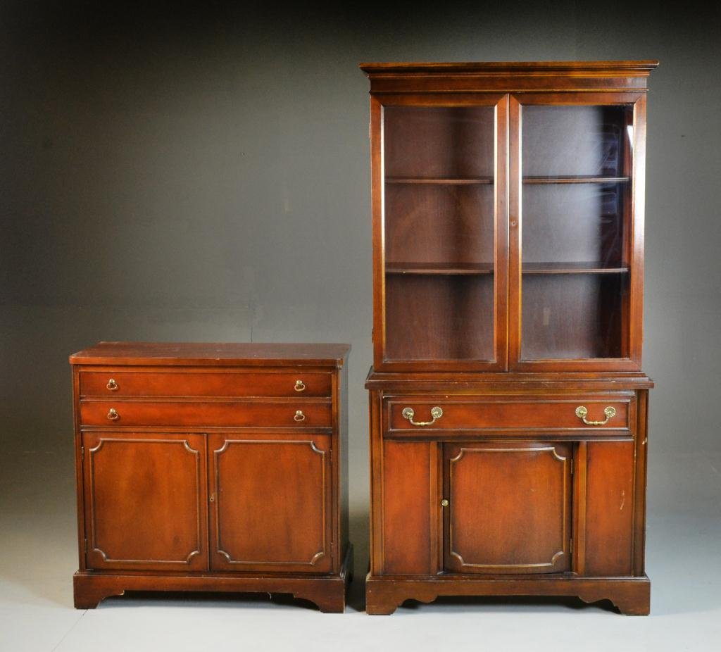 (2) Pieces Federal Style Furniture: To include a china hutch with two glazed doors above a single drawer and one single door, along with a server with two drawers above two doors, largest measures 67" H x 35" W x 15" D circa mid 20th ce