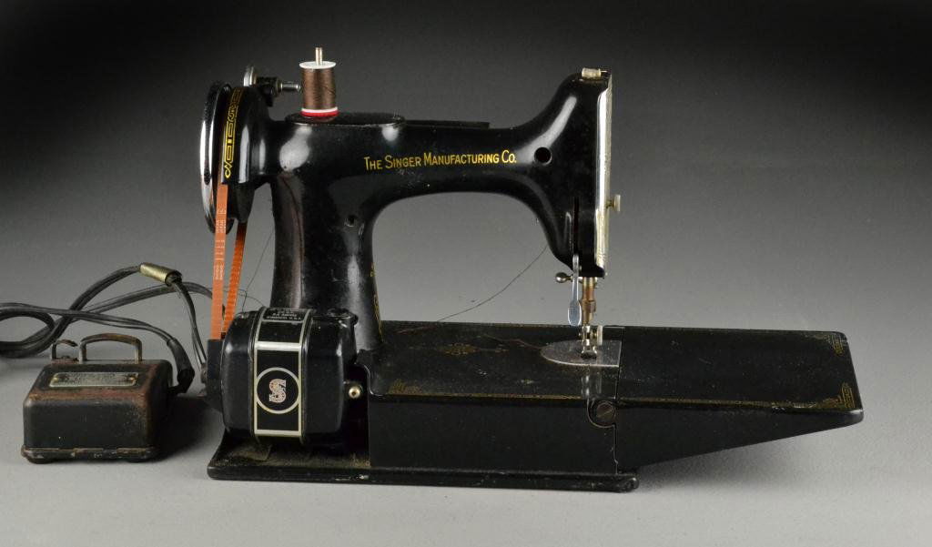 Singer Portable Electric Sewing Machine #221-1: Small portable machine in carrying case, largest is 12" H, circa 20th century. Condition: good. Property of Sena Bowling, Davison, Michigan.
