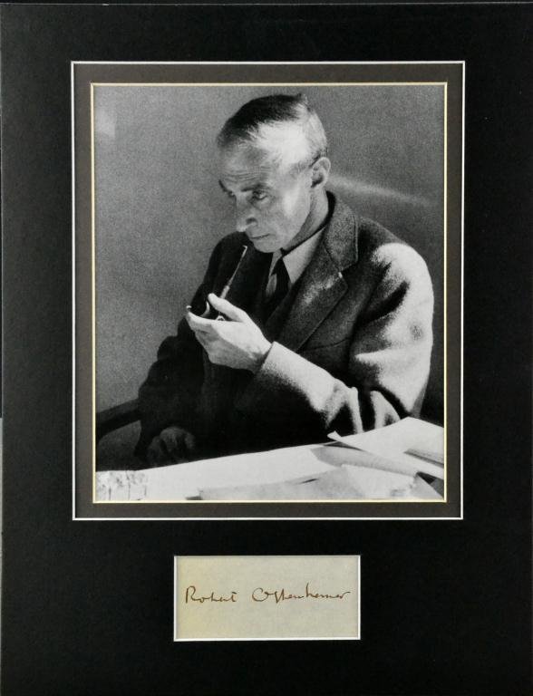 Dr. Robert Oppenheimer Autograph & Photograph: Autograph & matted photograph of Julius Robert Oppenheimer (1904 - 1967) theoretical physicist, and often called " the father of the atomic bomb," 14" H x 11" W sight and matting. Certificate of authe