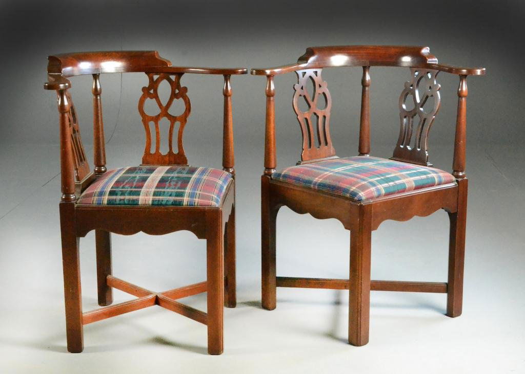 Pair Chippendale Style Mahogany Corner Chairs: Having pierced splats, scalloped apron and x-stretchers, plaid upholstery, 33.5" H x 24" Square, circa 20th century. Condition: good. Property of Oxford, Michigan, gentleman.