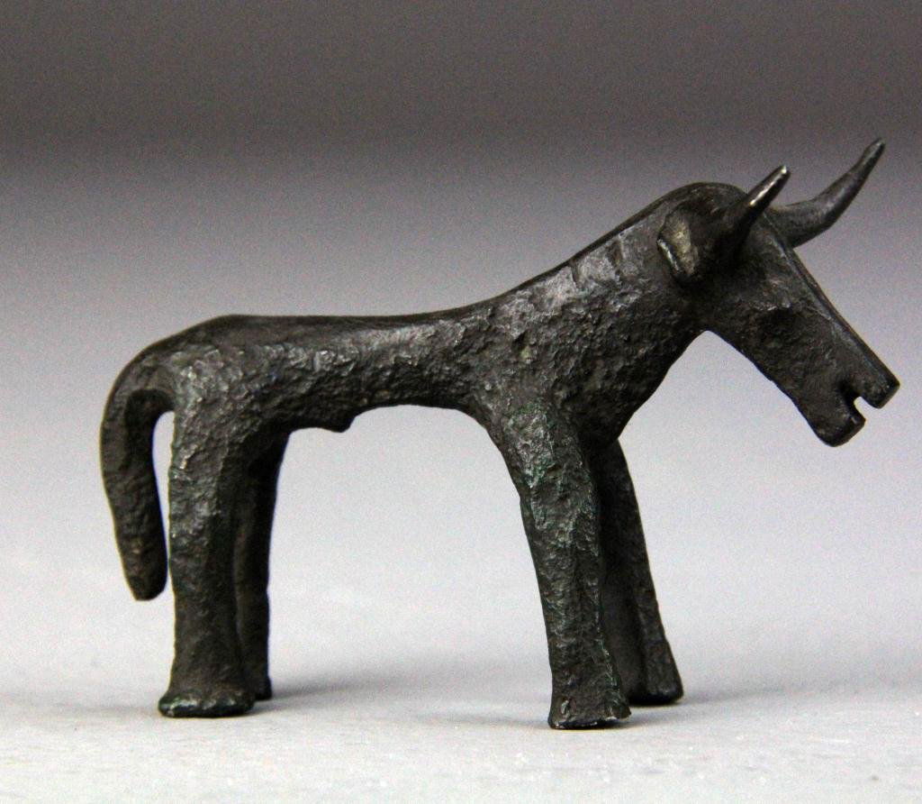 Style of Fernando Botero Bronze Sculpture: Depicting a stylized bull with curved horns, unsigned, Fernando Botero born 1932 in Columbia; New York artist known for working in bronze, 3" L x 2.125" H, circa 20th century. Condition: good. Propert