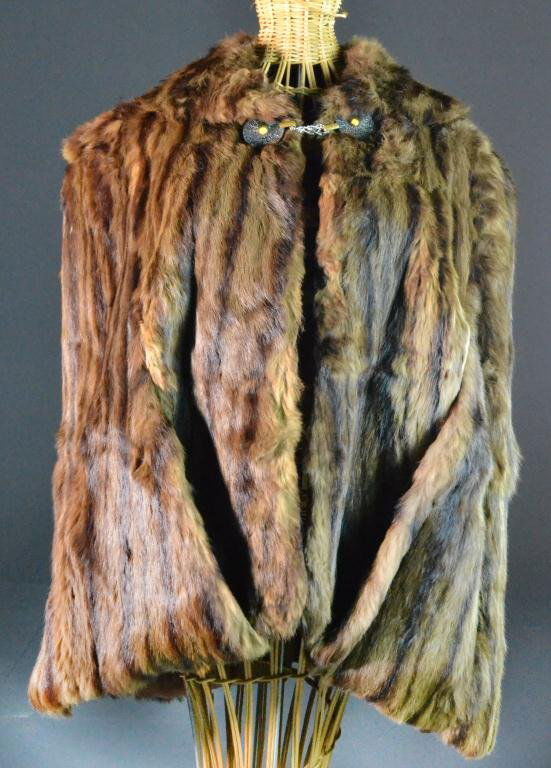 Ladies Vintage Mink Fur Coat-Cape: Brown mink fur collared coat-cape with circular decorative hook and chain closure and silk lining, approximately 20" W (shoulder) x 28" L, label reads Morton's Washington D.C, monogrammed C.B.W. insid