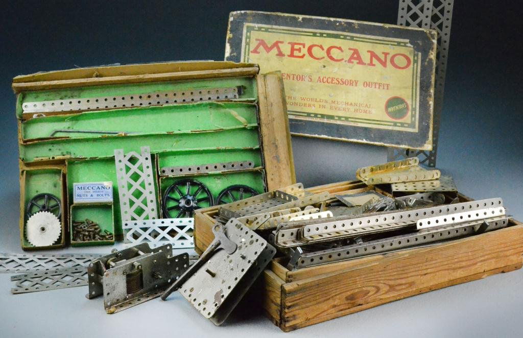 Meccano Erector Set in Original Box: To include motor, three wheels, gears, girders, nuts/bolts, made in Liverpool, England, circa 1950. Condition: some rust to metal parts, box is original but somewhat damaged. Property of Columbiaville