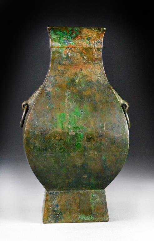 Chinese Ming Archaic Style Bronze Hu Vase: Having two mask handles with free ring, 11.5"H, circa 16th-17th century. Property of a Houston Texas Gentleman.