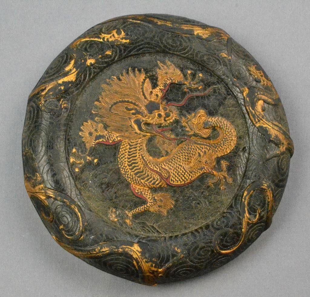 Chinese Circular Inkstone: Depicting dragon on front and symbols to back, 5" Diameter. Condition: good. Property of Grosse Pointe, Michigan, gentleman.