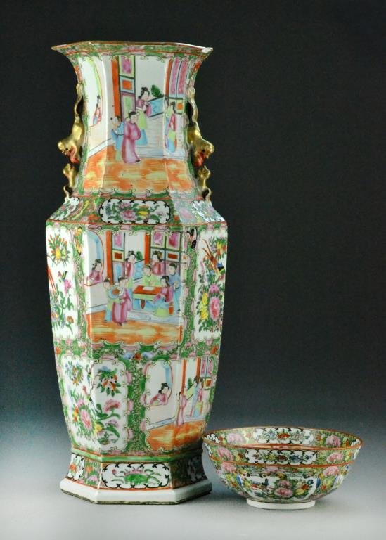 (2) Pcs. Chinese Rose Mandarin Porcelain: The vase painted to depict figures, fruit, and flowers, with two gilt handles molded as opposing foo dogs with ball, 23"H, together with a large bowl painted inside and out to depict figures, birds, a
