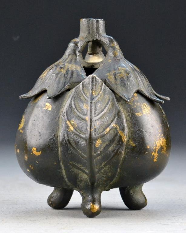 Chinese Qing Gold Splashed Bronze Censor: Depicting triple egg plants, tripod censor, 5.25"H X 4.5"D, circa 19th century. Property of a Houston Texas Gentleman.