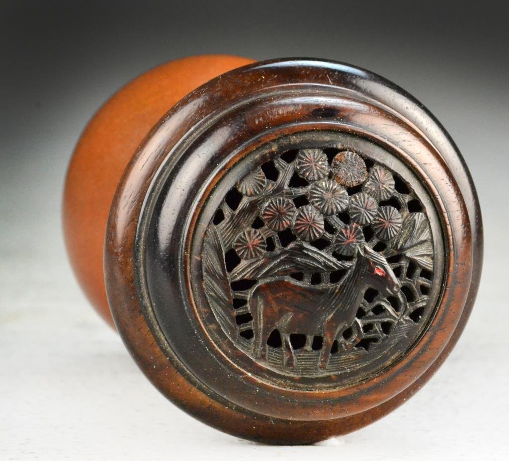 Chinese Qing Carved Gourd Cricket Cage: Hardwood mounting and lid, center of lid is carved coconut shell depicting deer, 4.5"L, circa 19th century. Property of a Houston Texas Gentleman.