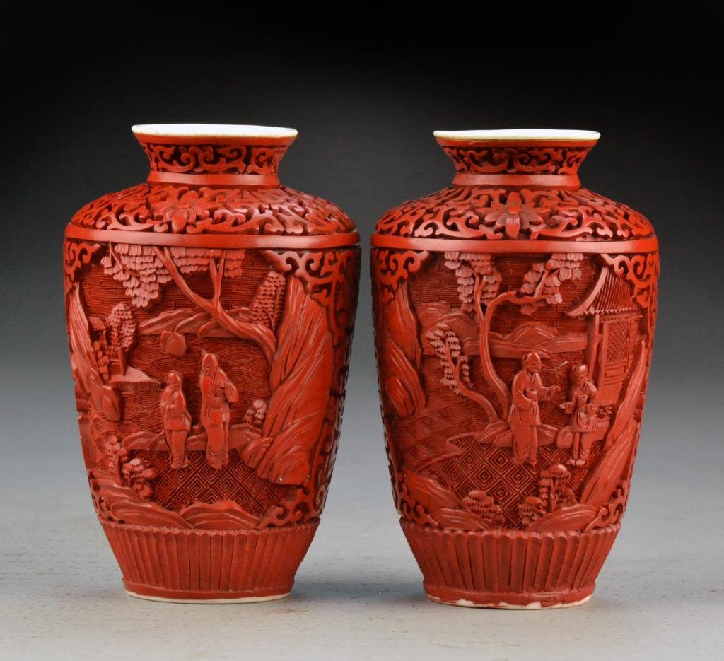 Pr. Chinese Republic Cinnabar Over Porcelain Vases: Depicting figures within landscapes, 5"H, circa early 20th century. Property of a Houston Texas Gentleman.