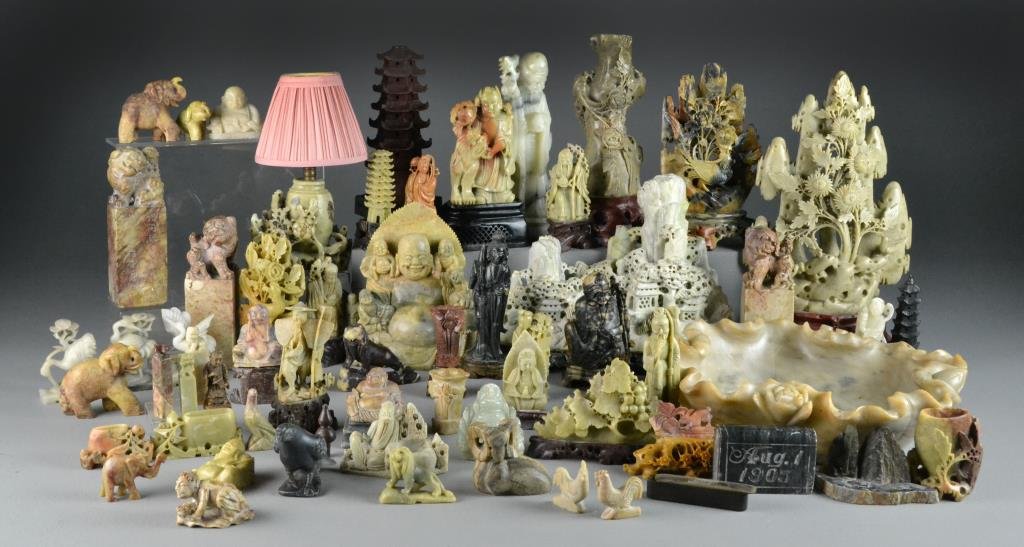(61) Pcs. Chinese Carved Soapstone Figures ETC: To include two carved soapstone landscapes, a large basin, several seal chops and pagodas, also animal and figural carvings, largest measures 14"H.