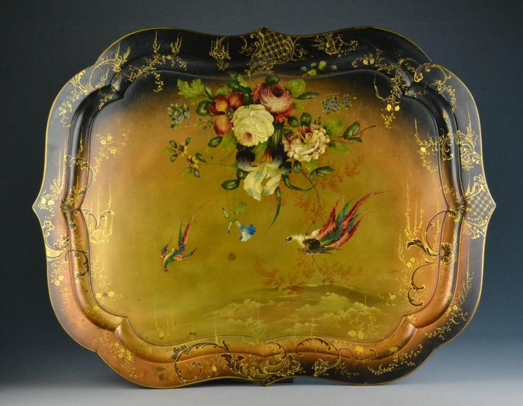 English Papier Mache and Lacquered Tray: English lacquer tray depicting exotic birds and flowers with gilt decoration to rim, 25" W x 32" L, circa 19th century. Condition: overall craquelure, minor wear to gilt on edge, lacquer good and othe