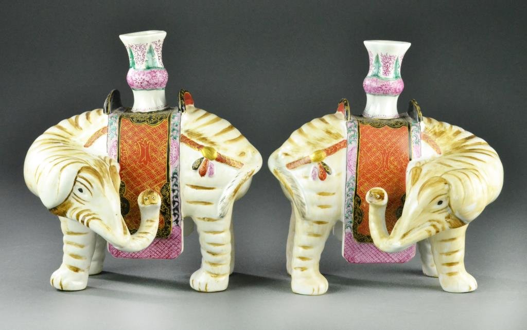 Pair Mottahedeh Porcelain Elelphant Joss Holders: Winterthur reproduction of Indian candleholders/joss holders, 9.5" H x 9" W x 6" D, circa 20th century. The Trust of Ethel Siegel, W. Bloomfield, Michigan.
