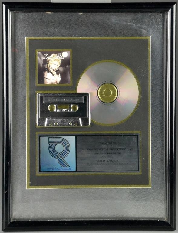 (2) Signed Garth Brooks Display & Dolly Parton: To include a framed display of 8 Garth Brooks CD's & autograph, also a framed Dolly Parton display, both displayed presented to record executive Larry Hicks for sales achievement, the largest is 17" H