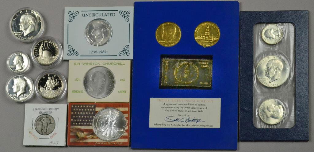 (9) Silver Coin Sets & Proof Coins: To include an American Silver Eagle 2002, an United States Bicentennial silver proof & silver uncirculated sets, two commemorative 1992 Columbus, & 1982 Washington silver half dollars, one 1986 commem