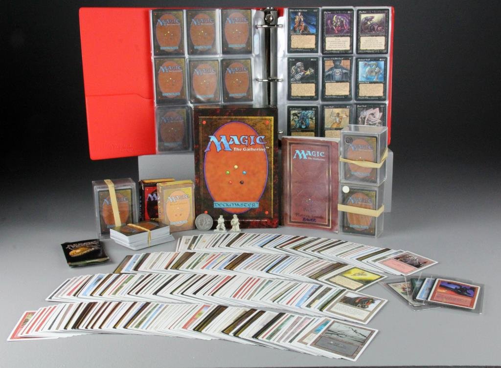 (1,000 plus or minus) Magic The Gathering Cards: To include 1,000 plus or minus, Magic The Gathering Cards, rare Volcanic Island card and others, along with The Gathering pocket players guide.