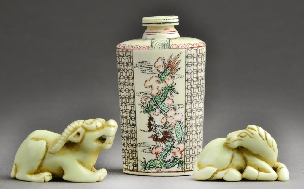 (3) Pcs. Chinese Hardstone & Ivory Snuff Bottle: To include two hardstone animal figures one carved to depict a horned beast and one carved to depict a reclining horse both finely caved and finely polished probably soapstone largest is 1.25"L, toget