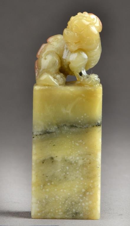 Chinese Soapstone Seal Chop: Carved to depict a foo lion atop a plinth, the seal face uncarved, 3.5"H. West Bloomfield Michigan Collection.