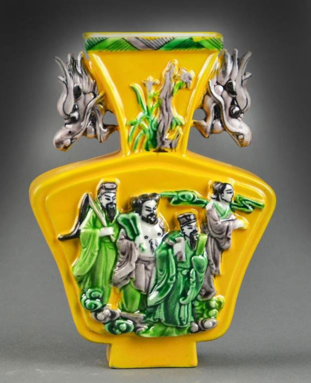 Chinese Tang Style Porcelain Vase: Molded in high relief to depict fugures to both sides, having two dragon formed handles, covered all over in a yellow, green and aubergene colored glaze, with unusual two character seal mark in underg