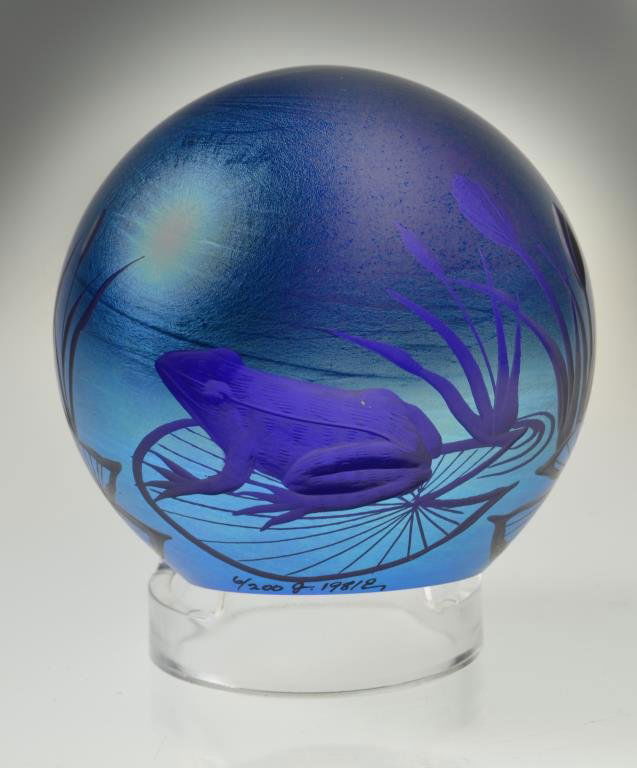 Lubomir Richter Orient & Flume Paperweight: With fine wheel cut decoration depicting lily pads, cat tails a frog and a dragonfly, number 6/2000 dated June 1981, 3.125"D x 3.125"H. The Trust of Ethel Siegel, W. Bloomfield, Michigan.