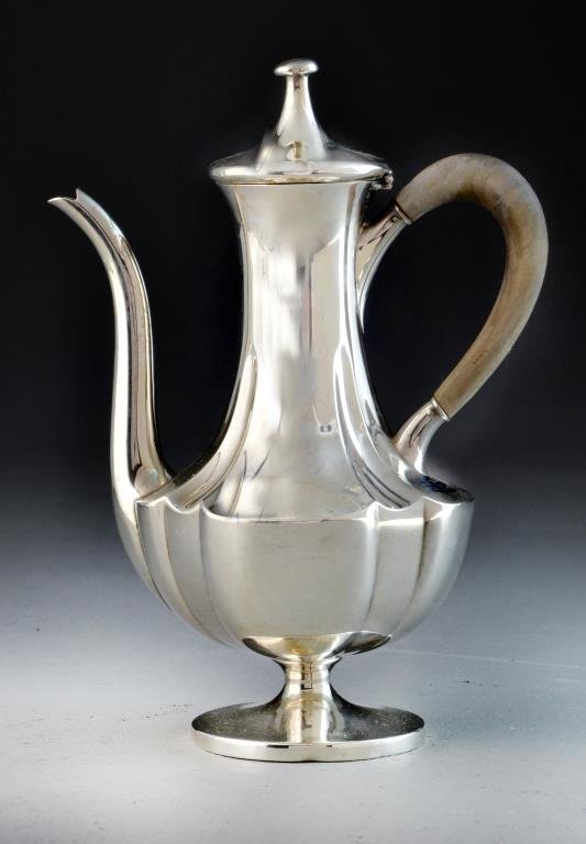 George Shiebler & Co. Sterling Teapot: Having a classical vase shape form, with turned wood handle, 12 oz total weight, 8.25"H. George W. Shiebler & Co. was a New York silver smith working in the 19th century. Property from Ethel Miller Si