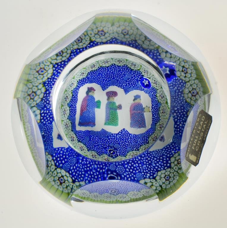 Whitefriars English Glass Paperweight: With fine internal decoration depicting three figures against a millefiori ground, with etched number 276 to underside and having its original paper label, 3.375" D, circa 20th century. The Trust of E