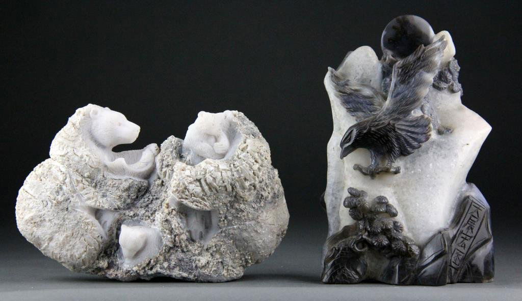(2) Chinese Agate Carvings of Eagle and Bears: Finely carved black and white agate depicting black eagle flying beneath the moon along with unusual white boulder with bear family and fish carved in part, largest is 7.5" H x 5" L, circa 20th centur