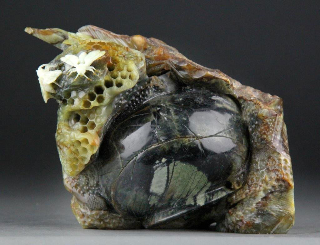 Chinese Jade Carving of Bees, Honeycomb and Honeypot: Finely carved jade from white to dark green in color depicting two bees on honeycomb atop honeypot, 5.5" H x 7" L, circa 20th century, good condition.