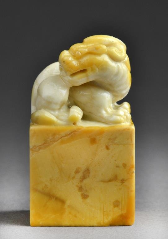 Chinese Soapstone Seal Chop: Carved to depict a foo lion atop a plinth, the seal face uncarved, 2.5"H. West Bloomfield Michigan Collection.