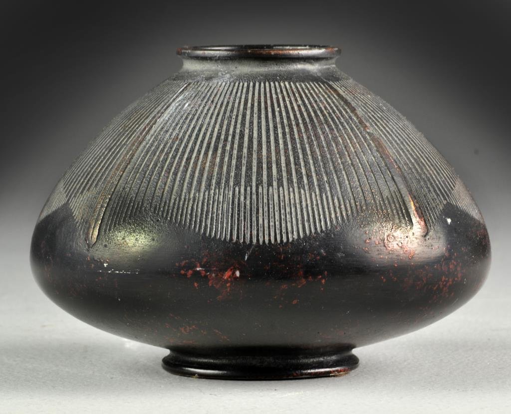 A Japanese Finely Cast Brnze Vase: Of unusual shape, finely cast and apparently unsigned, 4.5"H, circa early to mid-20th century. Provenance: Formally in the collection of Gary Culpepper of Culpepper Galleries-Santa Fe, New Mexico.