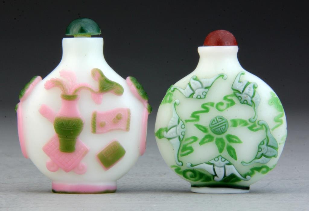 (2) Pcs Chinese Peking Glass Snuff Bottles: Both having fine applique decoration, on depicting bats contesting a coin, the other scholarly objects largest measures 2.75"H.