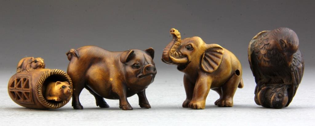 (4) Japanese Harwood Netsuke: To include eagle, elephant, pig and mice, two bearing 2 character mark, tallest is 1.625"H.