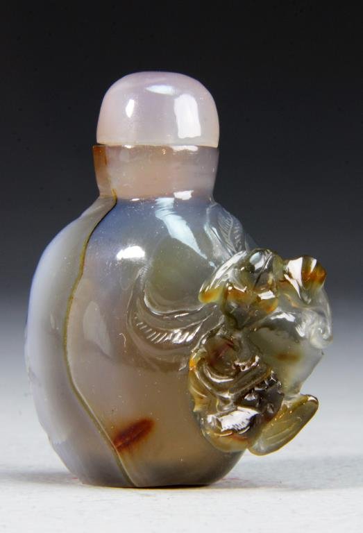 Chinese Carved Agate Snuff Bottle: Finely carved in high relief to depicting two opposing bats, raised on short foot ring, 3.25"H.