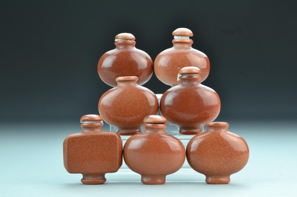 (8) Chinese Stone Snuff Bottles: Opaque stone with glittering surface, various shapes, tallest is 2.2"H. From the collection of David Bell who worked for an Italian steel company in China during the 1980's.