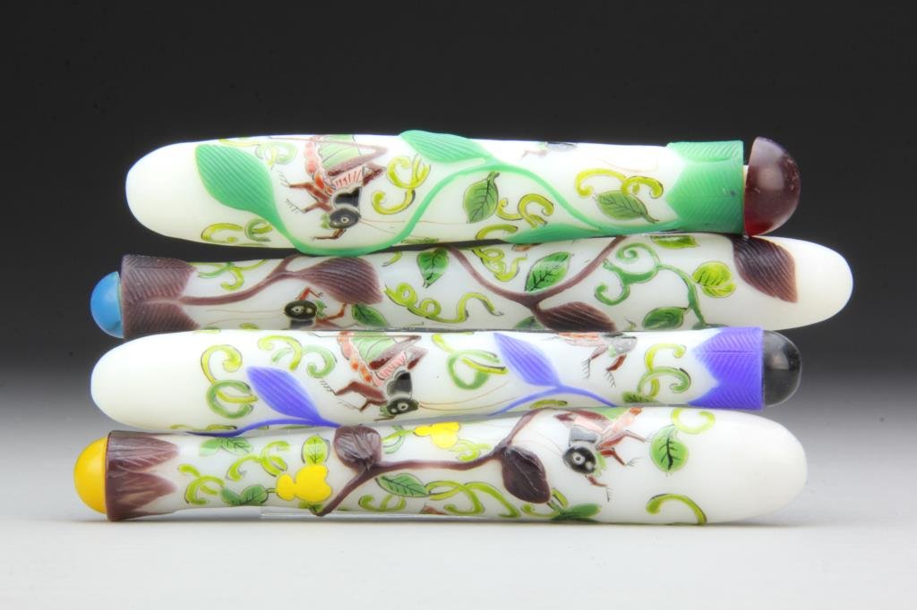 (4) Chinese Peking Glass Snuff Bottles: Oblong bottles painted to depict crickets and gourds, having leaf overlay, complete with stoppers,longest is 5.75"L. From the collection of David Bell who worked for an Italian steel company in China 