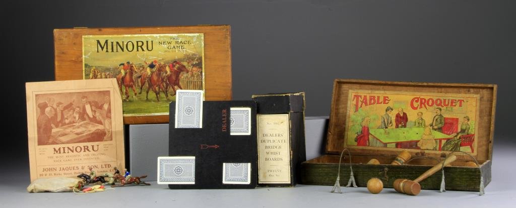 (3) Antique Table Top Gaming Toys: To include a Milton Bradley table top croquet game, some mallets with losses, a John Jaques & Son Limited London "The New Race Game Minoru" with six lead racing horses, metal markers and original boar
