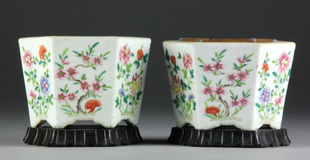 Pr. Chinese Qing Famille Rose Porcelain Flower Pots: Each finely enameled to depict lotus blossoms and tendrils, having a red China stamp to bottom, each having fitted hardwood stands and copper liners, probably original, 5" H, circa 19th century. Colle