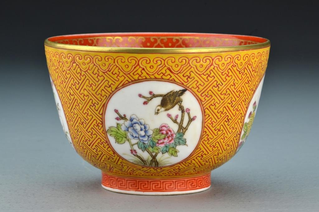 Chinese Famille Rose Porcelain Bowl: With four roundels depicting birds and blossoming flowers, the balance depicting symbols, interior with Shou symbol circled by bats, interior and base with iron red glaze, base with four character mar