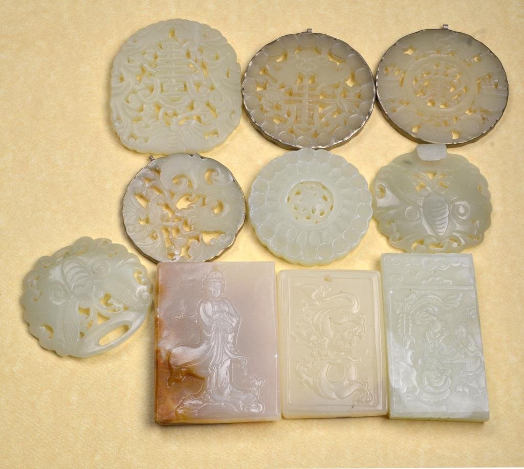 (10) Chinese Carved Jade & Hardstone Plaques: Including a buckle carved as opposing bats, there circular plaques with metal mounts, and several others with various carvings, largest is 2.5"H.
