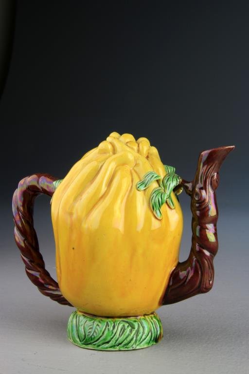 Chinese Kangxi Porcelain Water Dropper: Shaped as a Buddist hand Citron with branch form handle and spout, 4.875" H circa 18th Century. Collection of the Late Robert Willis owner of R.F. Willis Galleries, Grand Rapids, Michigan.
