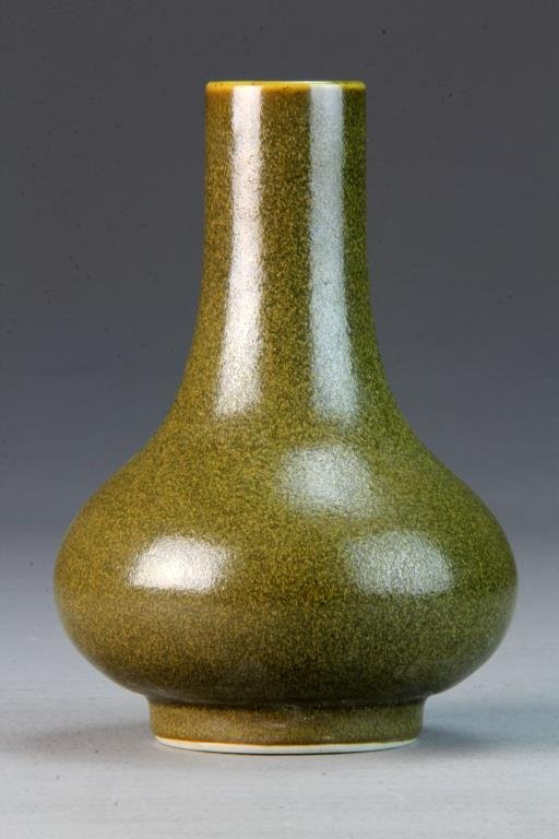 Chinese Eel Skin Glazed Porcelain Vase: Of squat bottle form, raised on short foot ring, base with remnants of an impressed seal mark, 7.5"H.