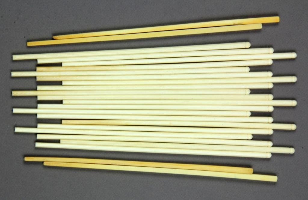 (24) Chinese Carved Ivory Chopsticks: All carved of simple form, some square but most round with ball shaped finial, 9.5"L Property of an Auburn Hills, Michigan Couple.