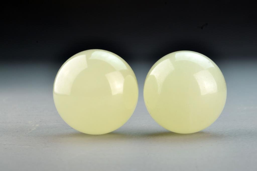 Pr. Chinese Jadeite Baoding Balls: Finely carved and polsihed, the stone an even white in color, each measures approximately 1.85"D.