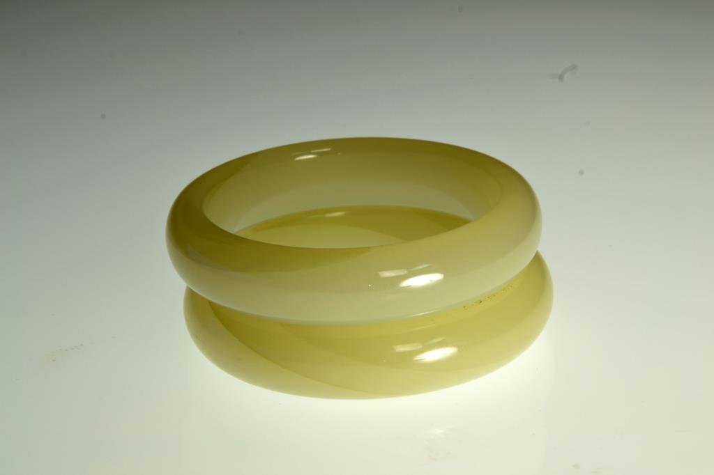 Pr. Chinese Mutton Fat Jade Bangles: Finely carved and polished, the stone an even white in color, outside diameter 3", inside diameter 2.5".