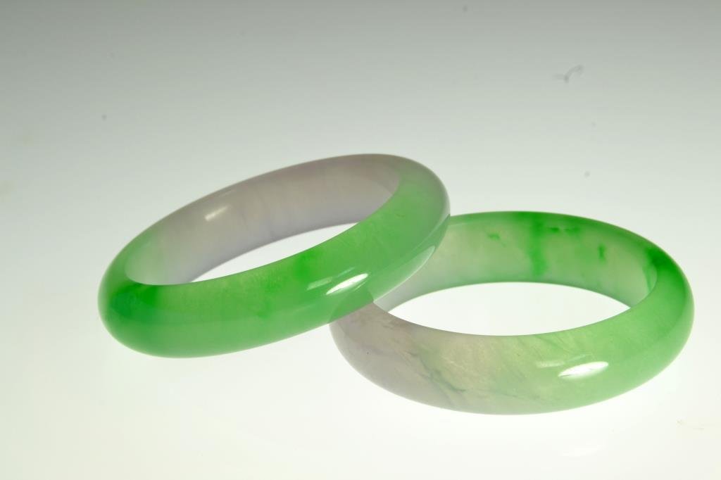 Pr. Chinese Jadeite Bangle Bracelets: Lavender graduating to apple green in color, well carved and polished, outside diameter 3", inside diameter 2.375".