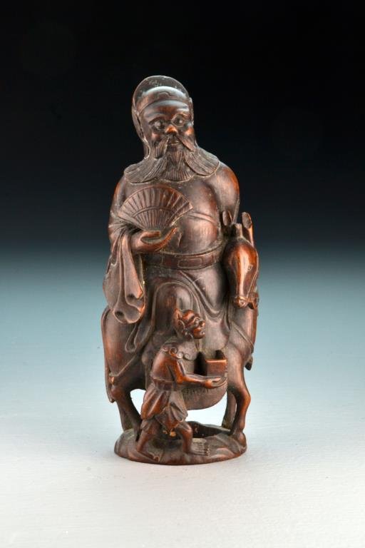 Chinese Qing Carved Bamboo Figure: Depicting a scholar seated on a horse with child holding a censor, having an attractive old surface 8.25" H, circa 19th Century. Collection of the Late Robert Willis owner of R.F. Willis Galleries, Gr