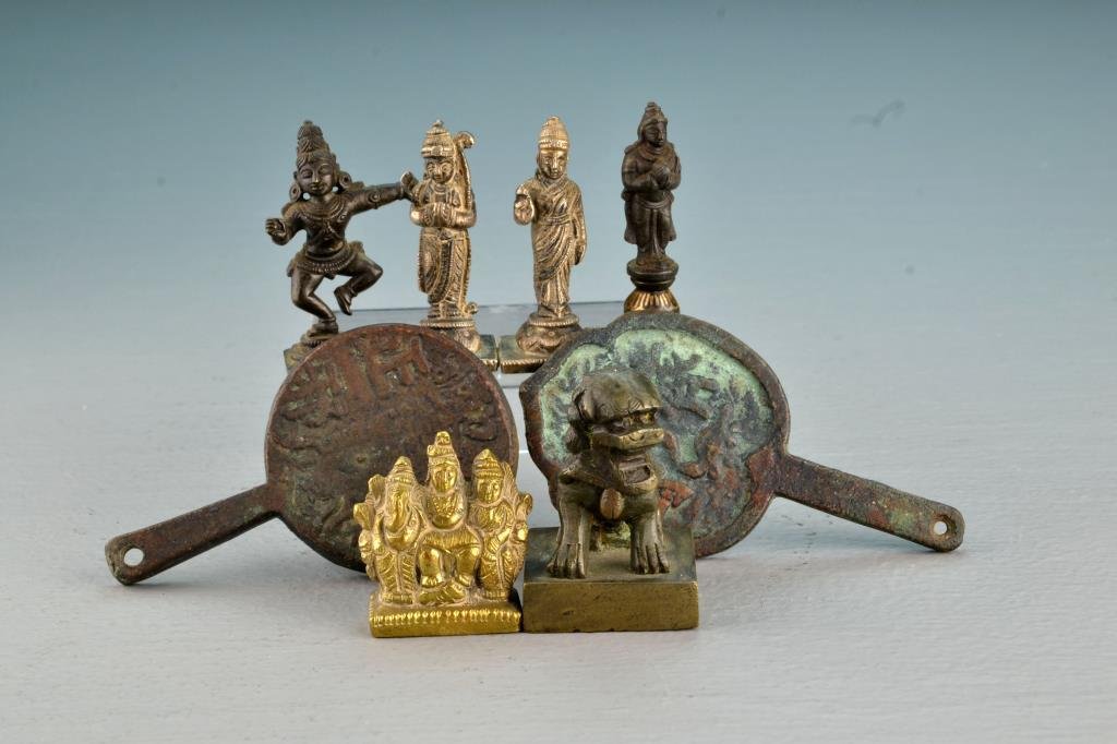 (8) Chinese Qing Bronze Pieces: To include two bronze hand mirrors, a seal chop with molded foo dog, and five bronze figures, largest measures 3.625" L circa 19th Century. Collection of the Late Robert Willis owner of R.F. Willis Ga