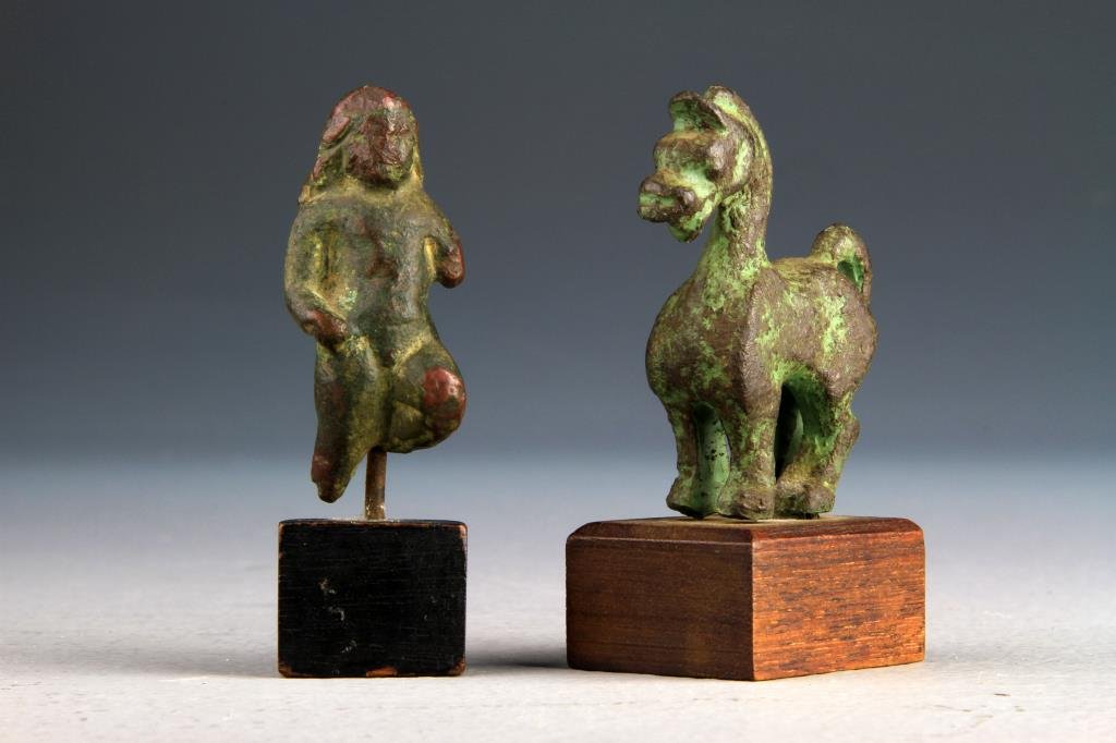 (2) Antique Chinese Bronze Sculptures: Of small scale depicting a horse and figure, both affixed to wood display stand, tallest is 3.125"H, circa 19th century and possible much earlier. Collection of the Late Robert Willis owner of R.F. Wi