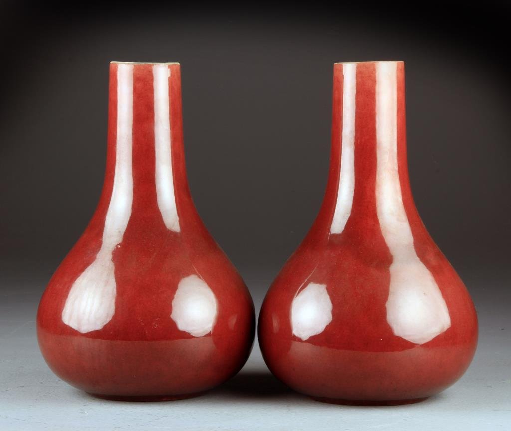 Pr. Chinese Strawberry Glaze Porcelain Vases: Having a bulbous body raised on short foot, 11" H, circa late 19th-early 20th century. Collection of the Late Robert Willis owner of R.F. Willis Galleries, Grand Rapids, Michigan.